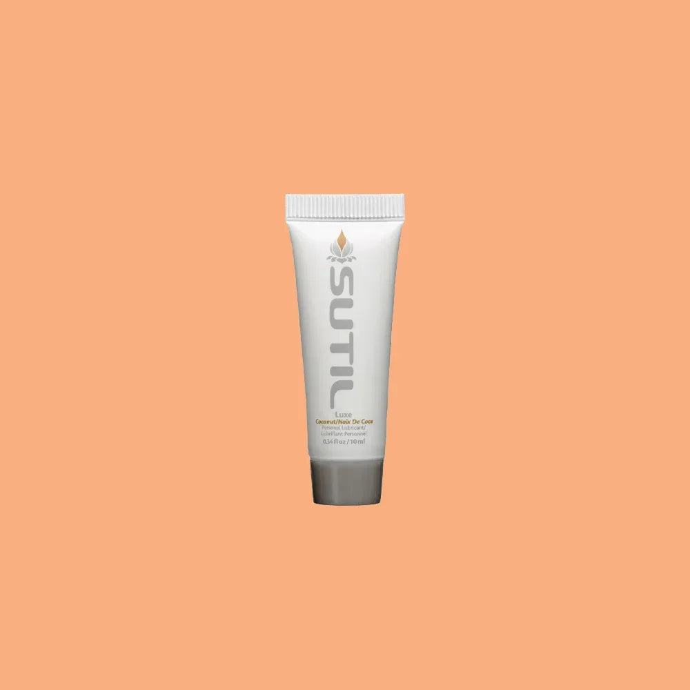 Mini Sutil Coconut Lube displayed over an orange background