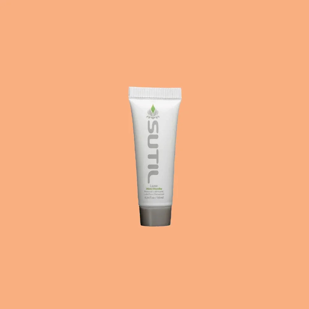 Mini Sutil Mint Lube displayed over an orange background
