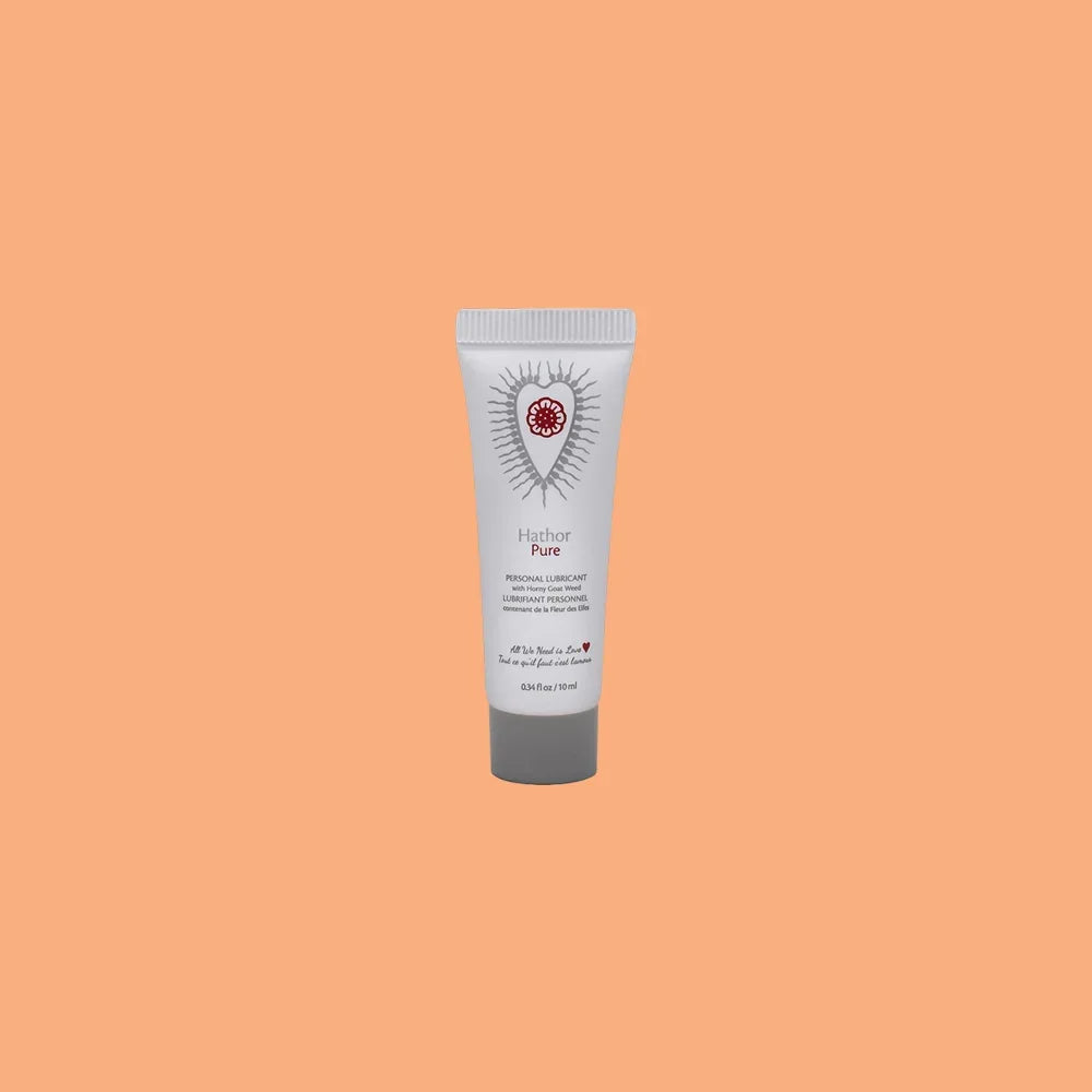 Mini Sutil Pure Lube displayed over an orange background